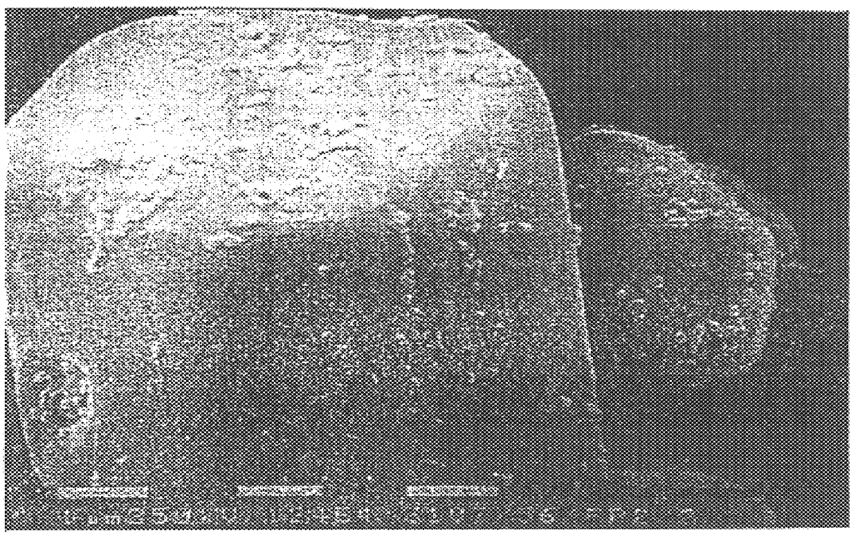 Phosphor composition with a coating of colloidal SiO2 particles and an oxygen compound of magnesium, calcium, barium, zinc, or aluminum