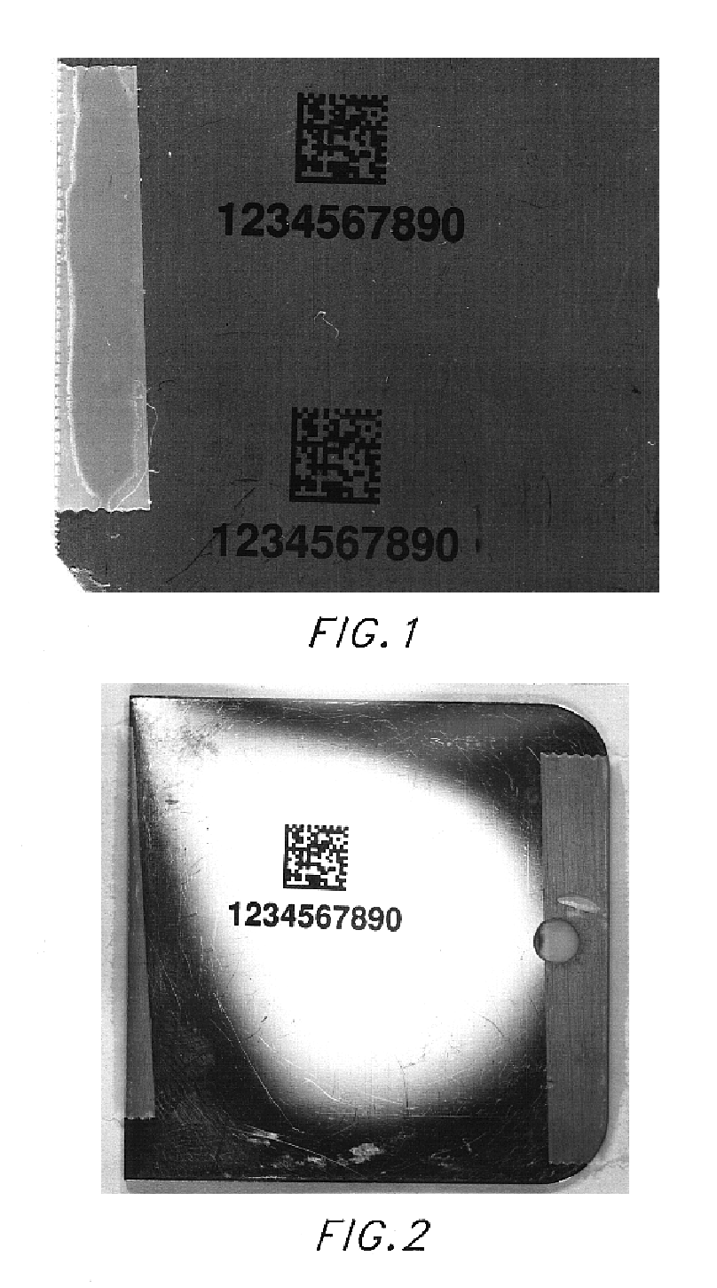 High contrast surface marking using irradiation of electrostatically applied marking materials