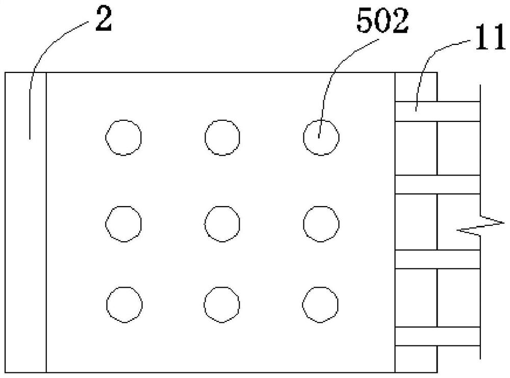 A vertical underflow constructed wetland device and method for sludge treatment