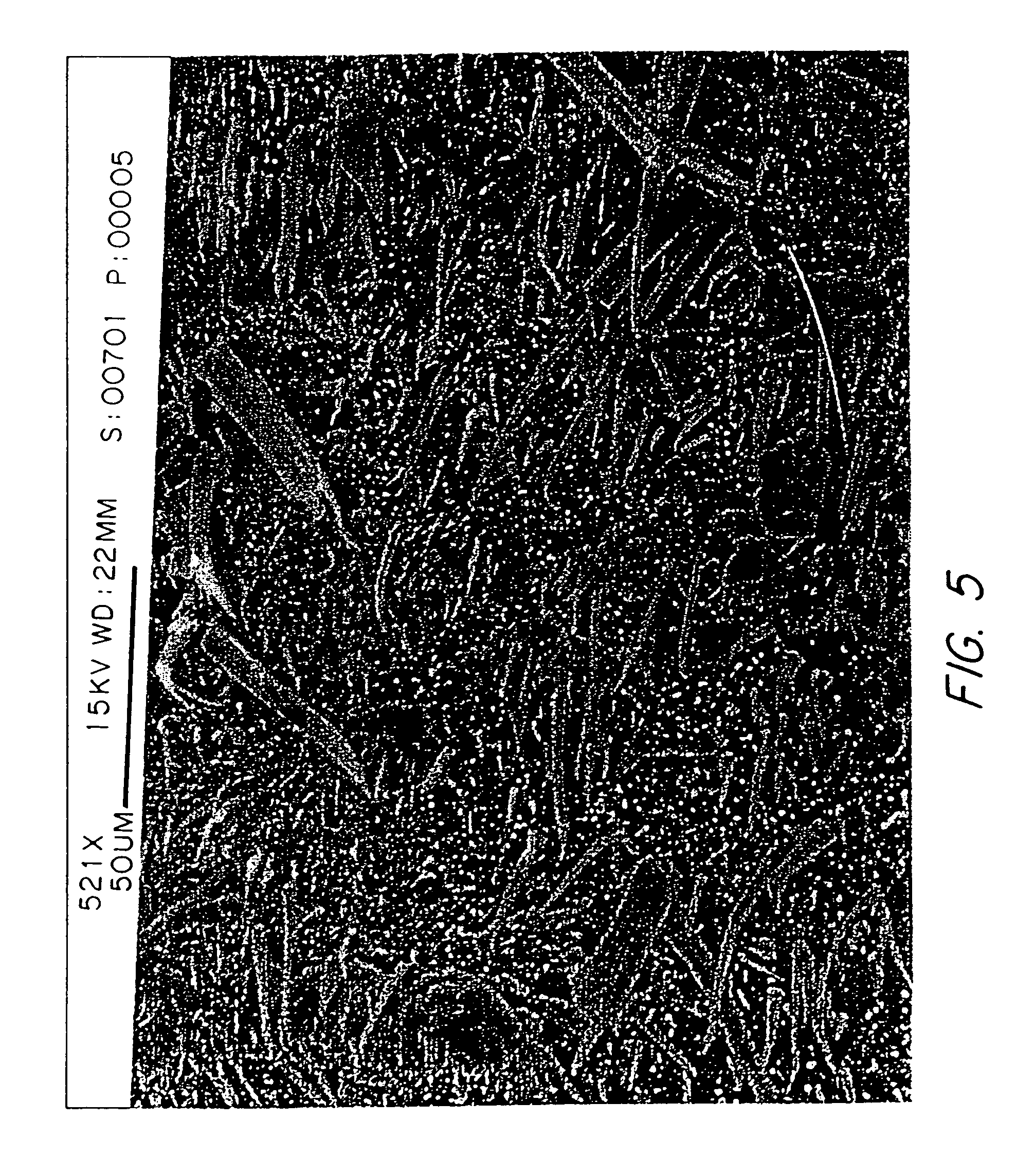 Composite structural components containing thermotropic liquid crystalline polymer reinforcements for optical fiber cables