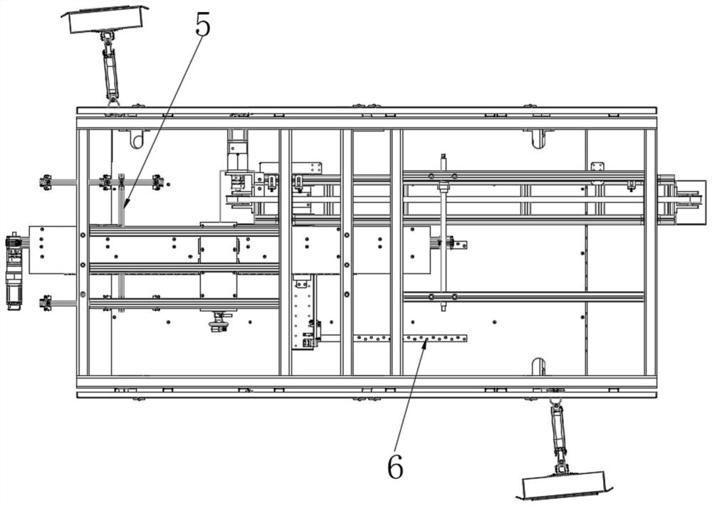 Material transfer device for abdominal pad processing