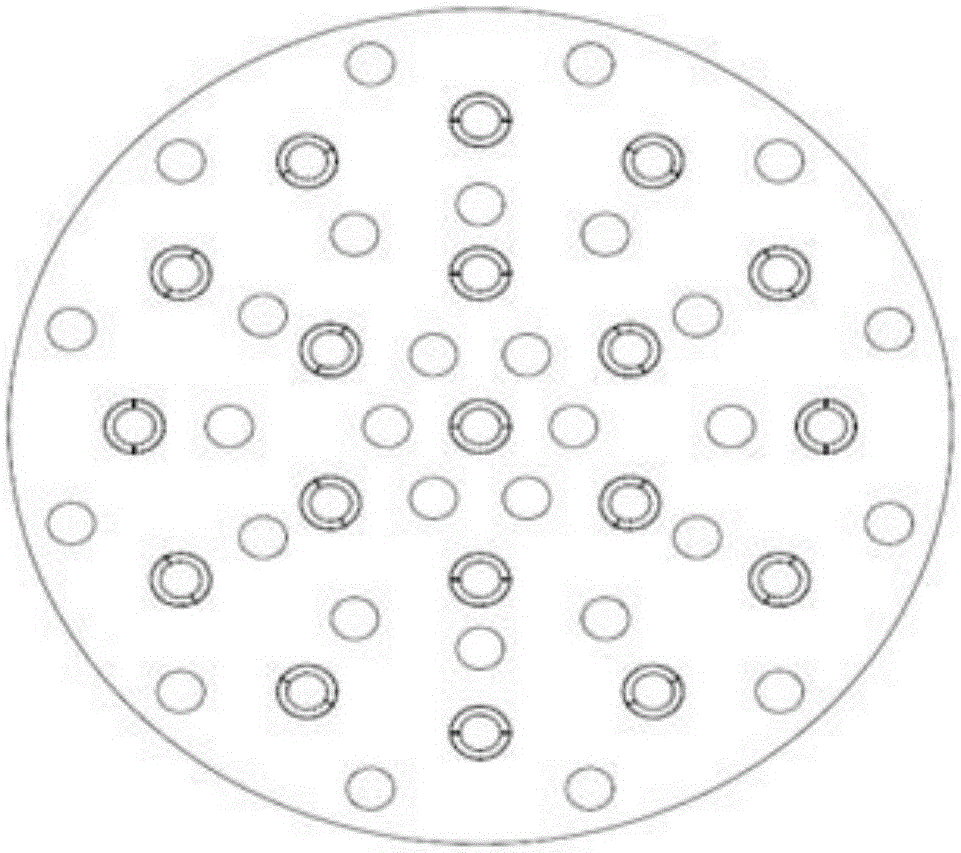 A light and heavy phase redistribution device for a liquid-liquid extraction packed tower