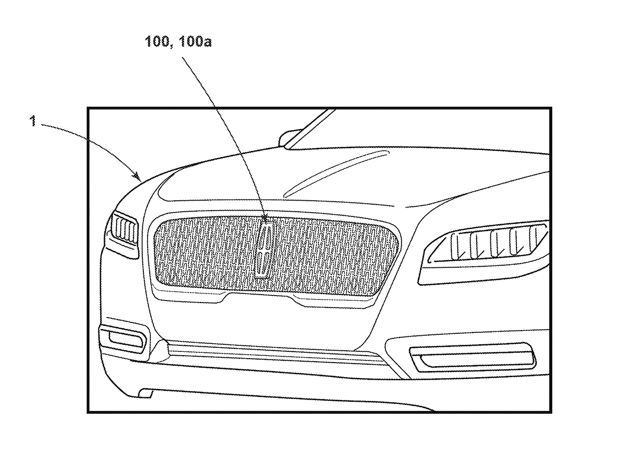 Iridescent badges for vehicles and methods of making the same