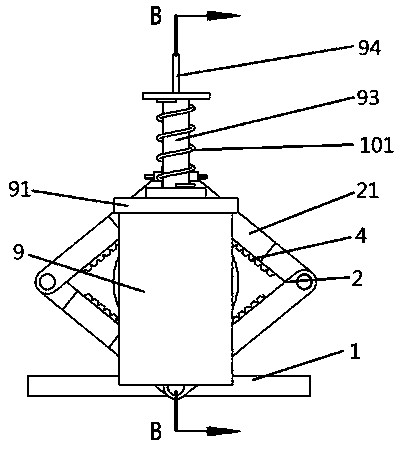 Rotary water spraying type glass bottle punching auxiliary clamping support