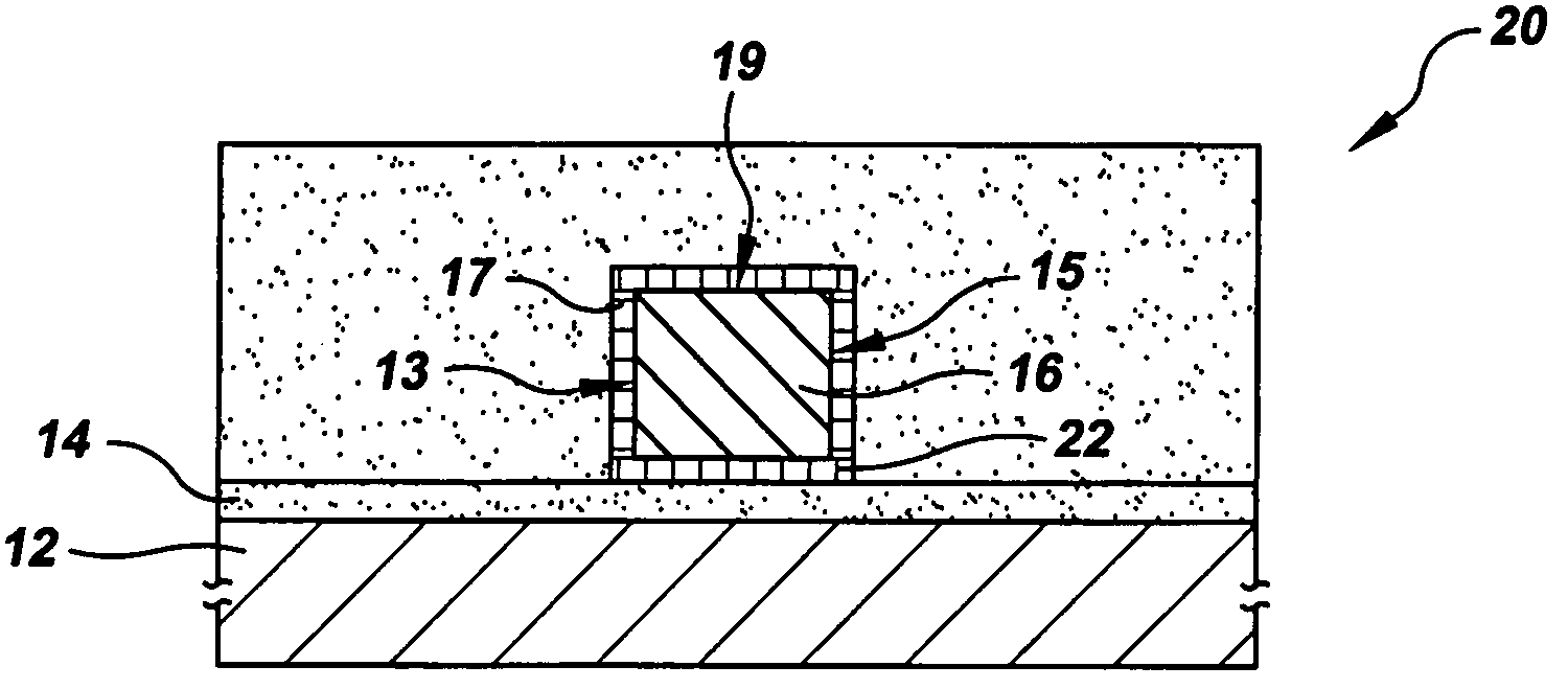 Microphotonic waveguide including core/cladding interface layer