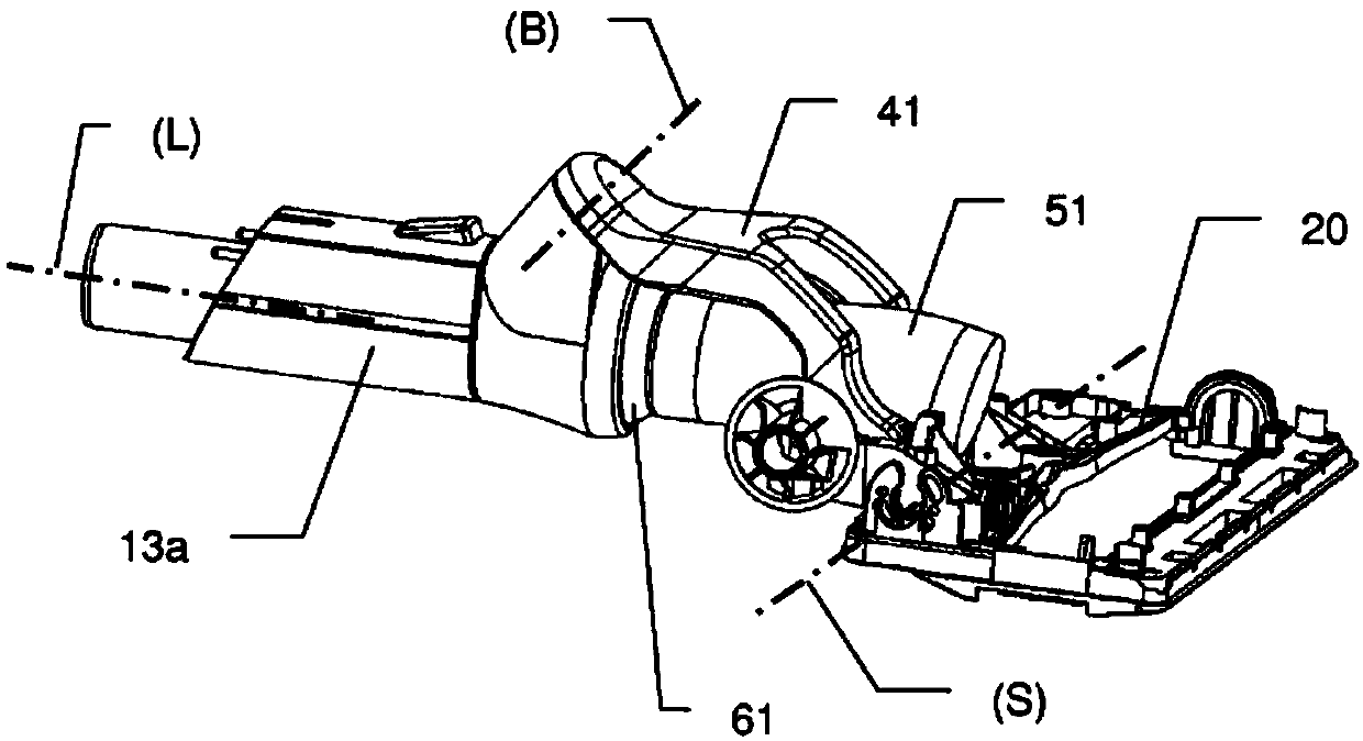 Vacuum cleaner having hinged brush head