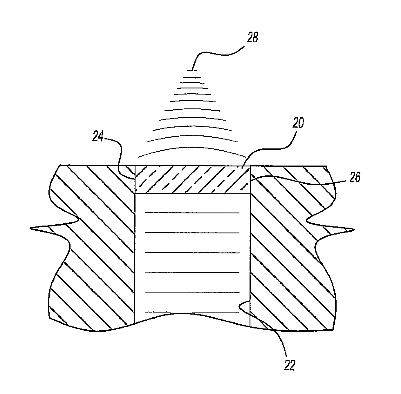 Gradient index lens for microwave radiation