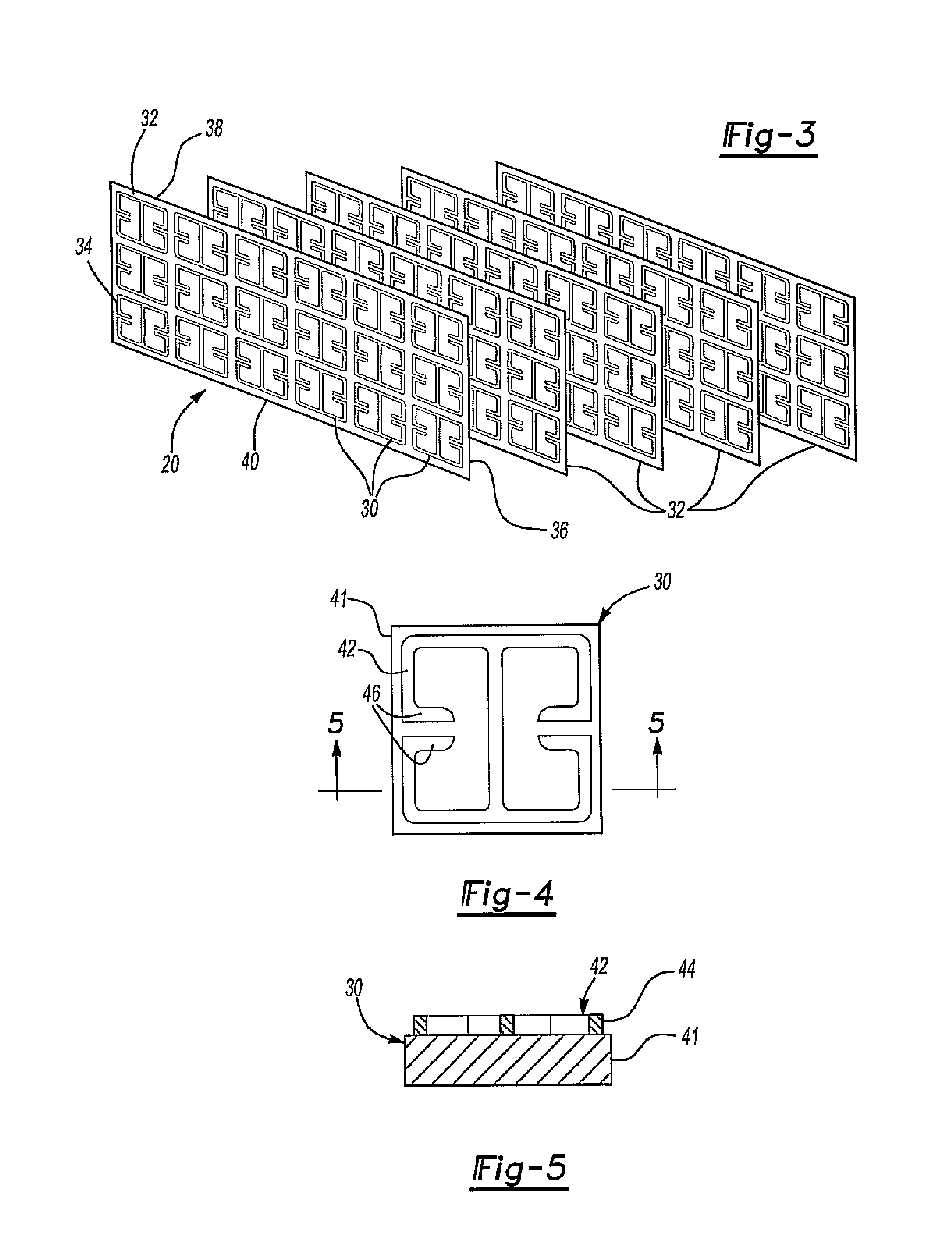 Gradient index lens for microwave radiation