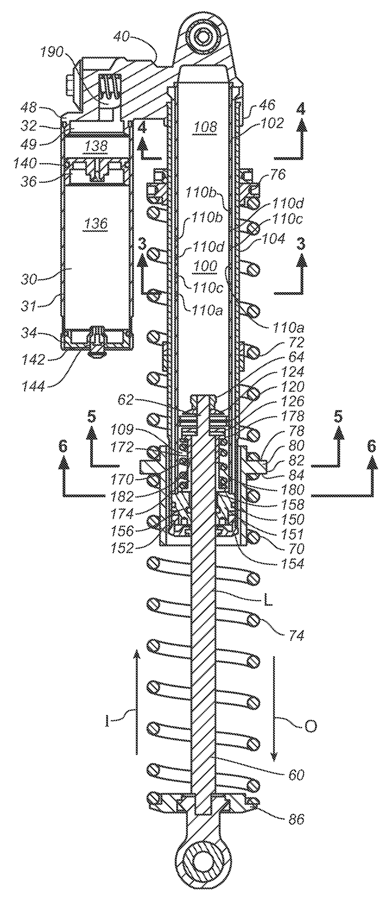 Twin tube damper with remote gas reservoir