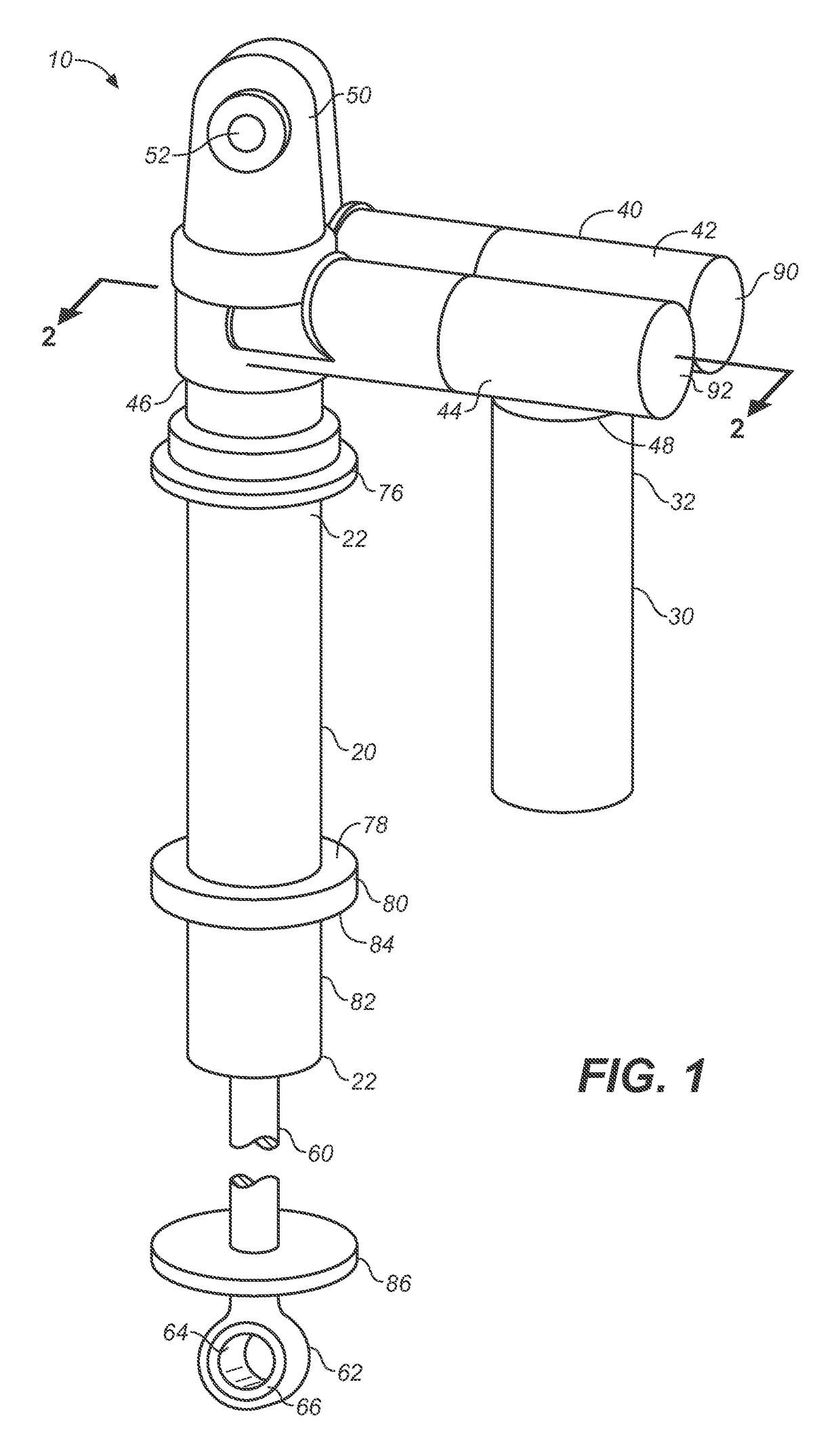 Twin tube damper with remote gas reservoir