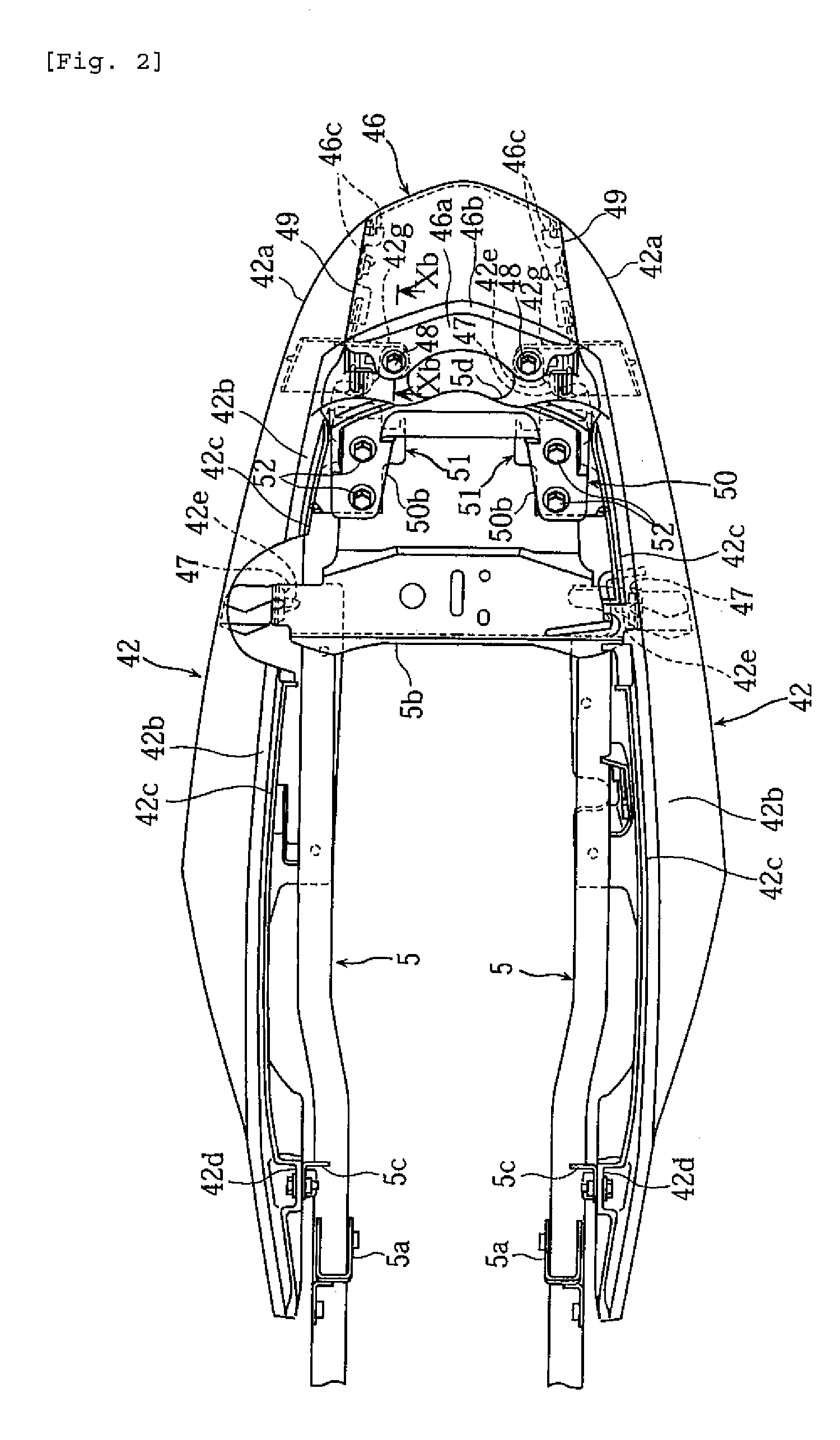 Motorcycle with grab bar attached to body frame below seat