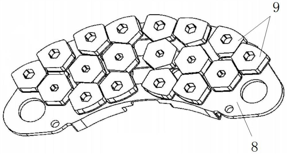 Triangular support and powder metallurgy brake pad with triangular support