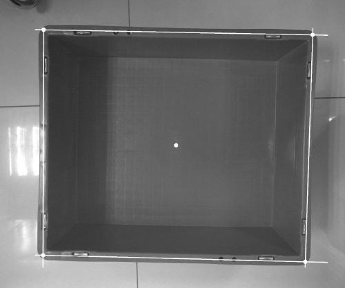 Turnover box automatic positioning method based on image geometrical characteristics