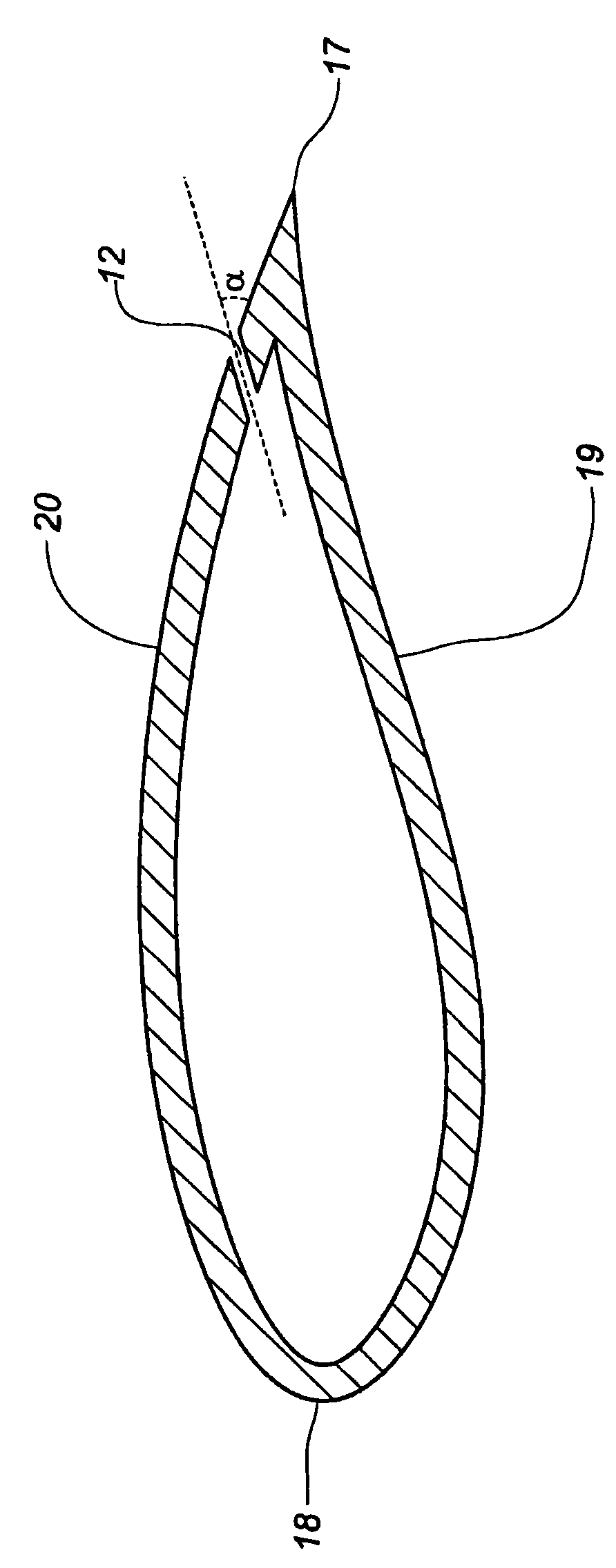 Wind turbine blade with lift-regulating means in form of slots or holes