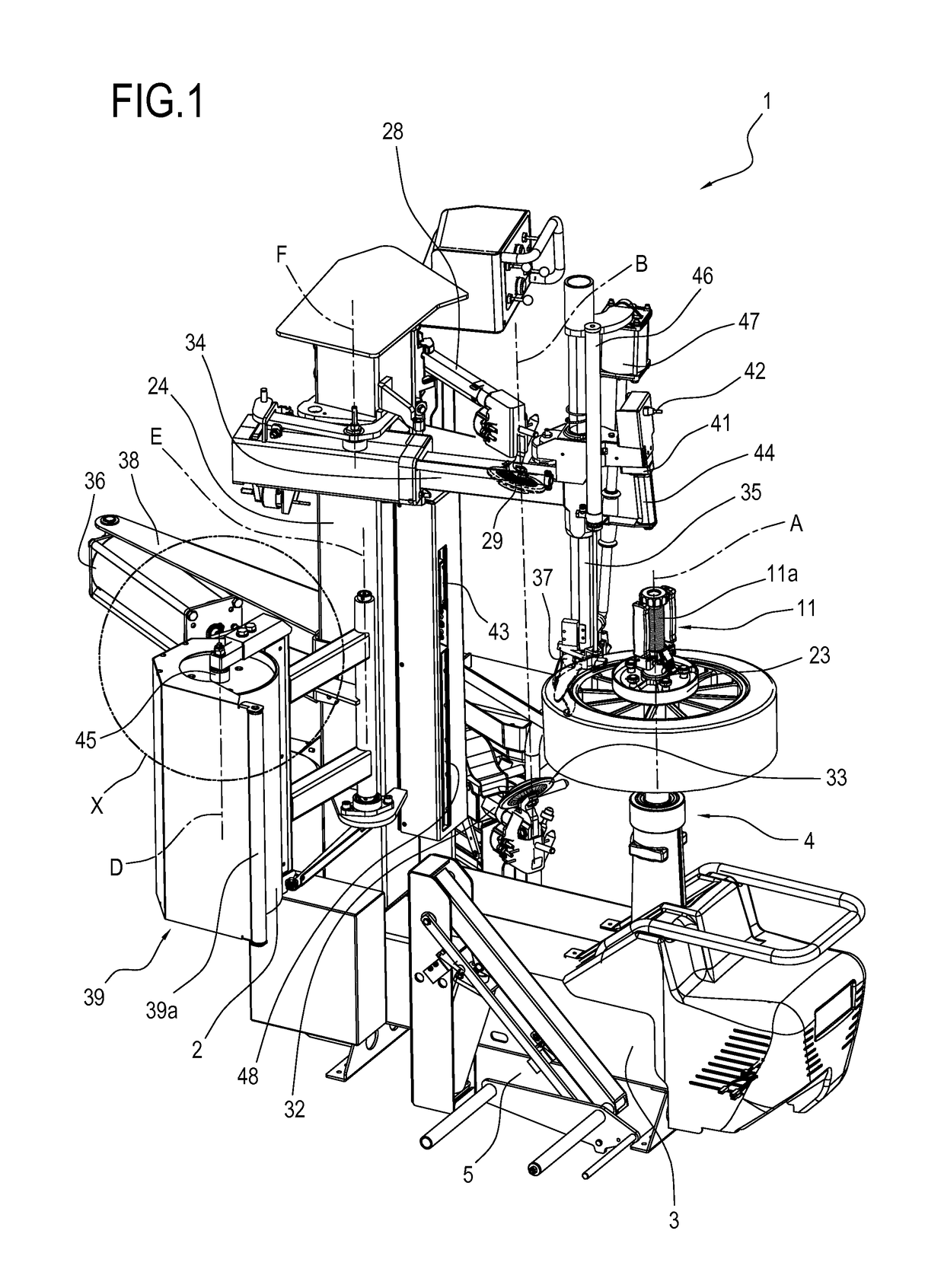 Machine for fitting and removing a tyre and method for operating the machine