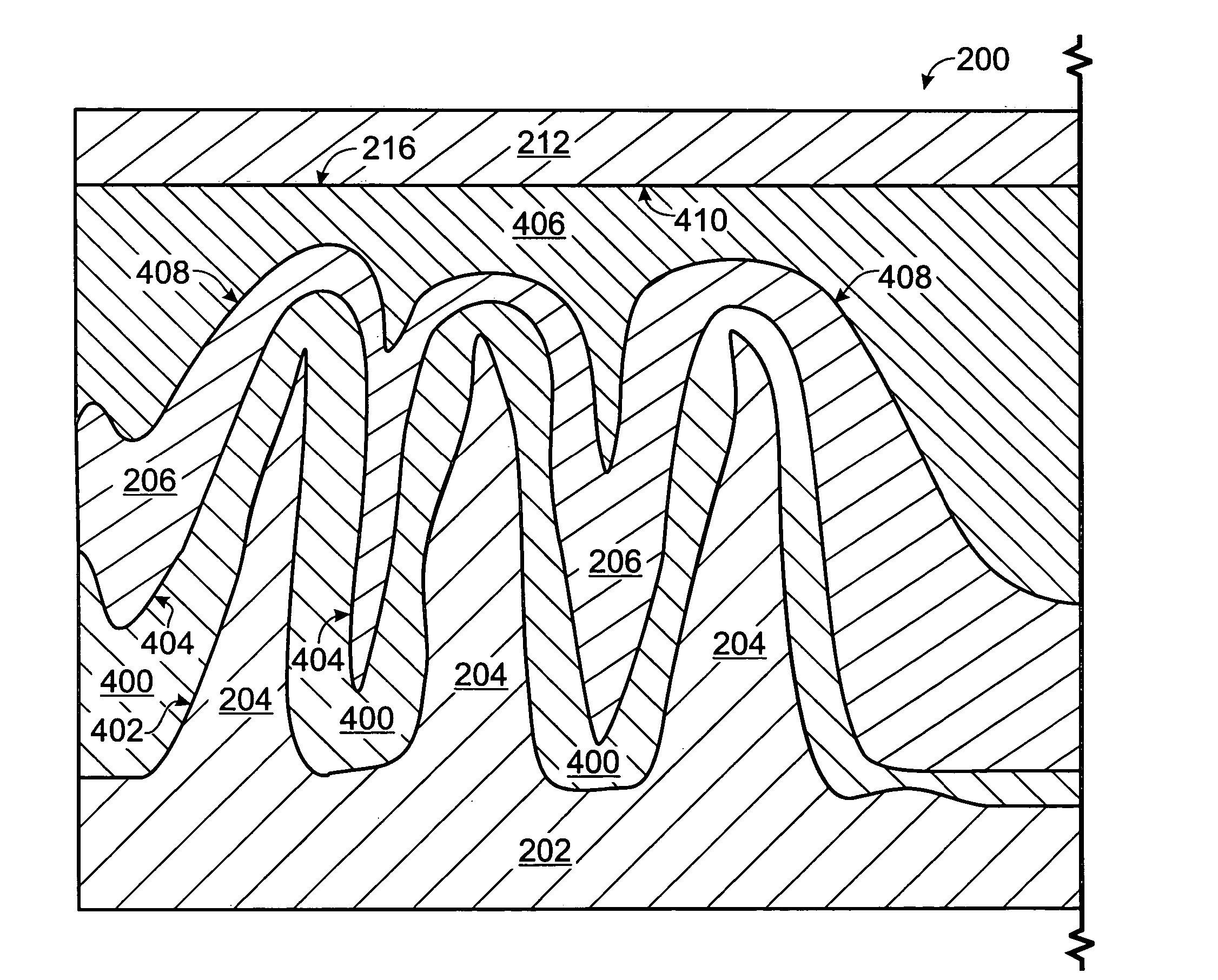 Nanotip electrode electroluminescence device with contoured phosphor layer