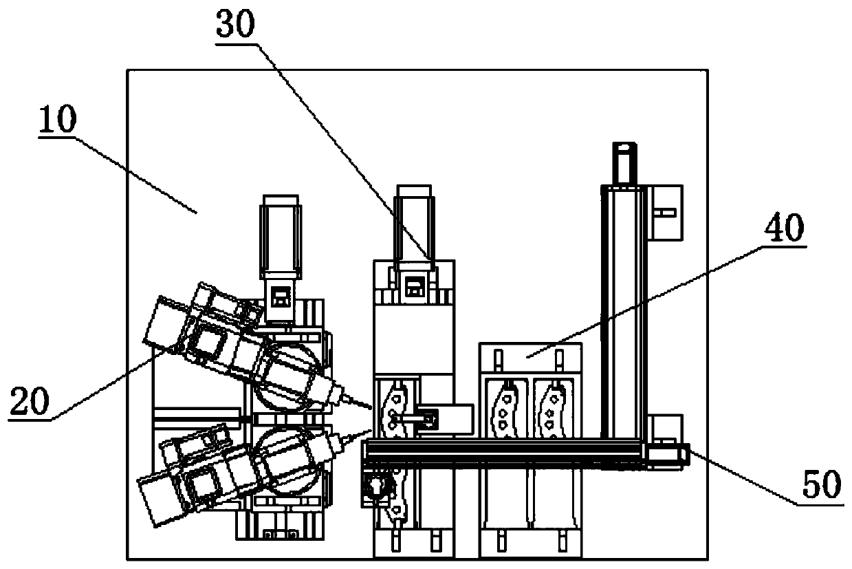 Full-automatic numerical control drilling machine for brake pad steel backing and power head assembly used in full-automatic numerical control drilling machine