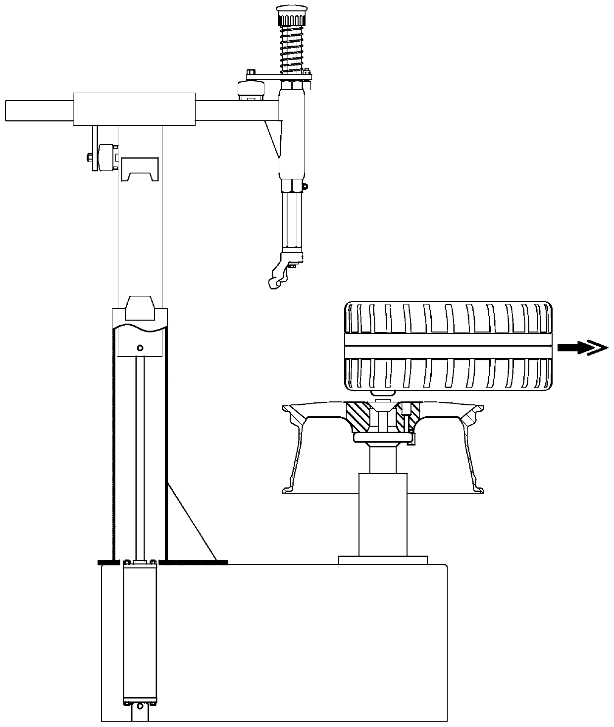 Tire disassembling and assembling machine