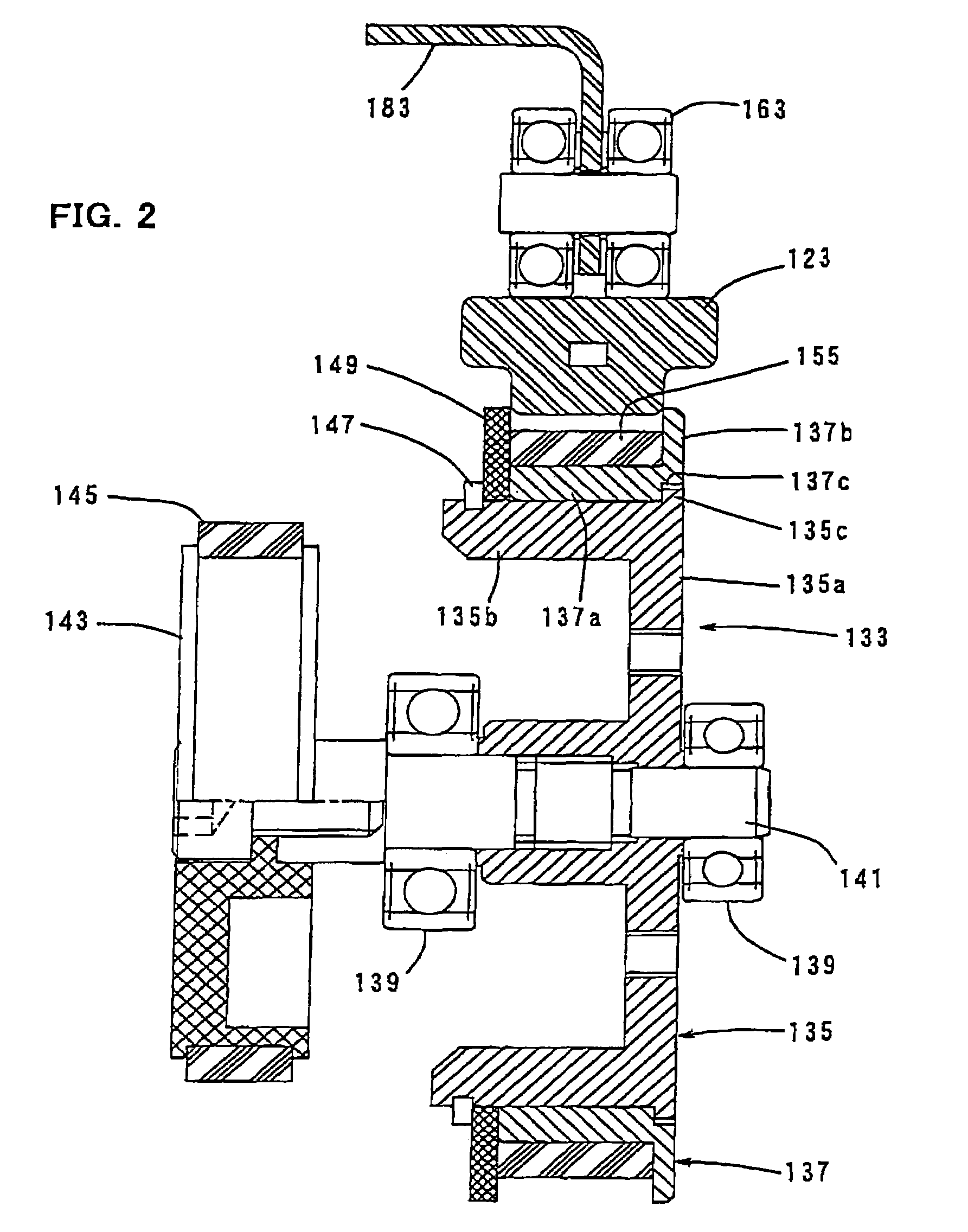 Driving tool having a two-part flywheel