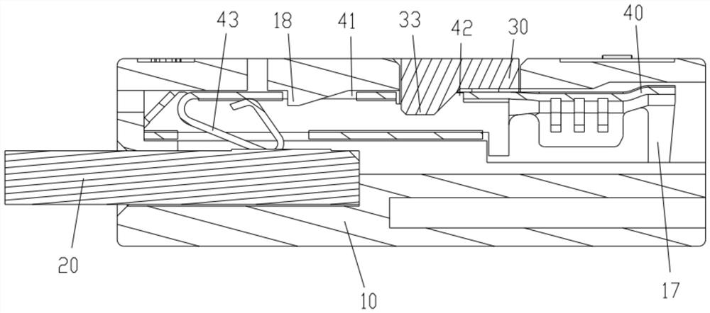 A fixing structure between a connector base and a circuit board