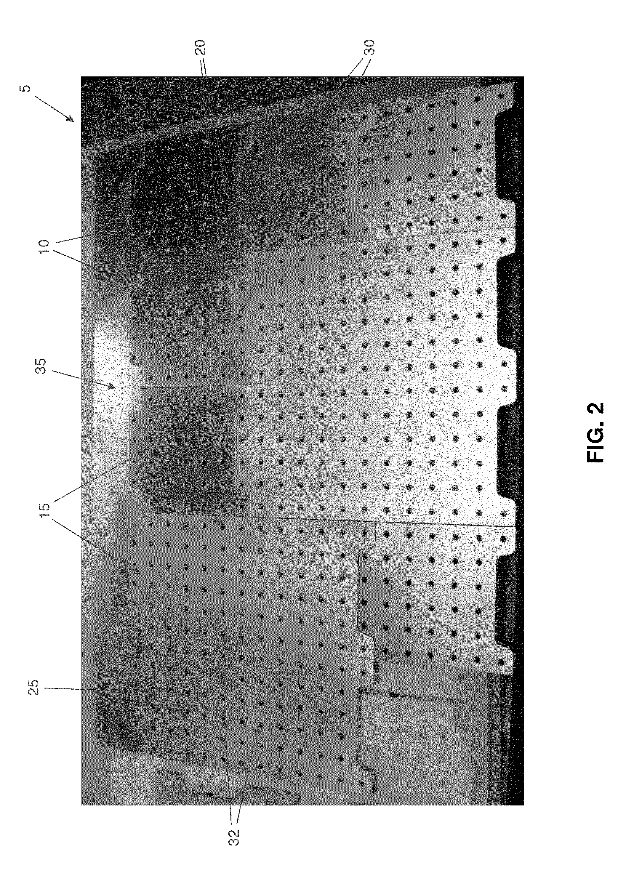 Modular fixture plate system for positioning a workpiece during a manufacturing and/or inspection process