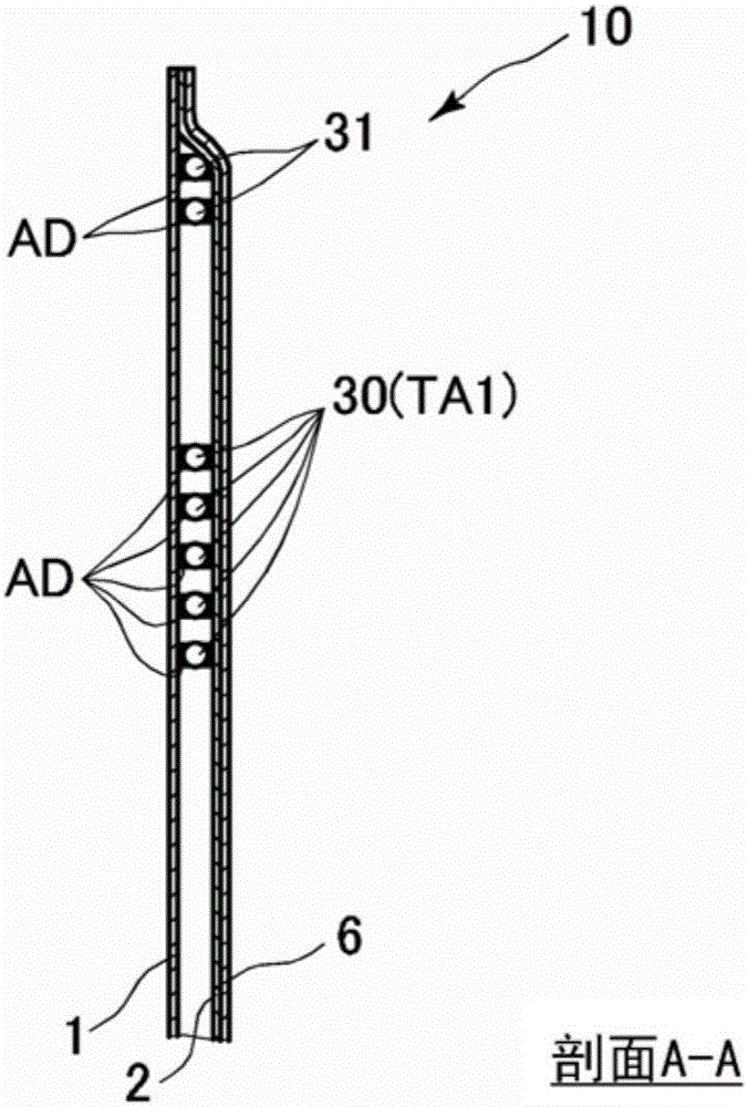 A disposable wearing article, a manufacturing apparatus and a manufacturing method