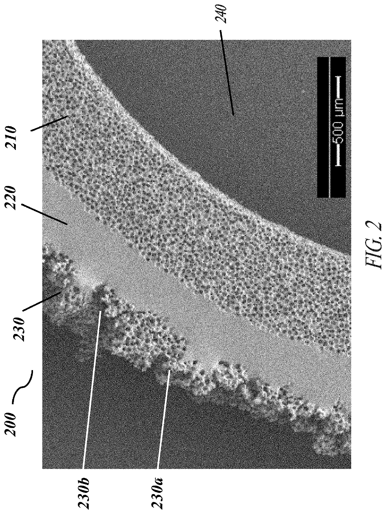 Corrugated microporous tissue interface for improved performance and infection resistance of vascular grafts and other implantable devices