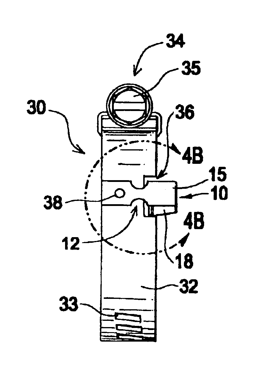 Locator tab and associated hose clamp