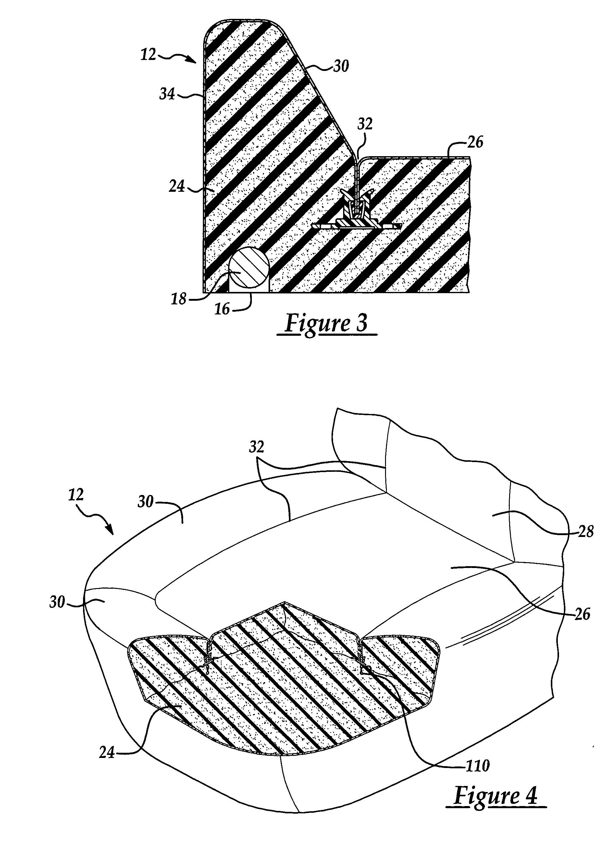 Attachment assembly for securing trim material to the padding of a vehicle seat