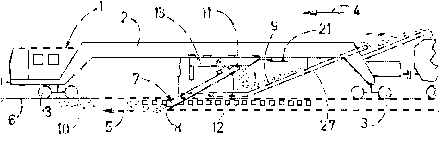 Machine comprising a lifting device for receiving bulk material of a track bed