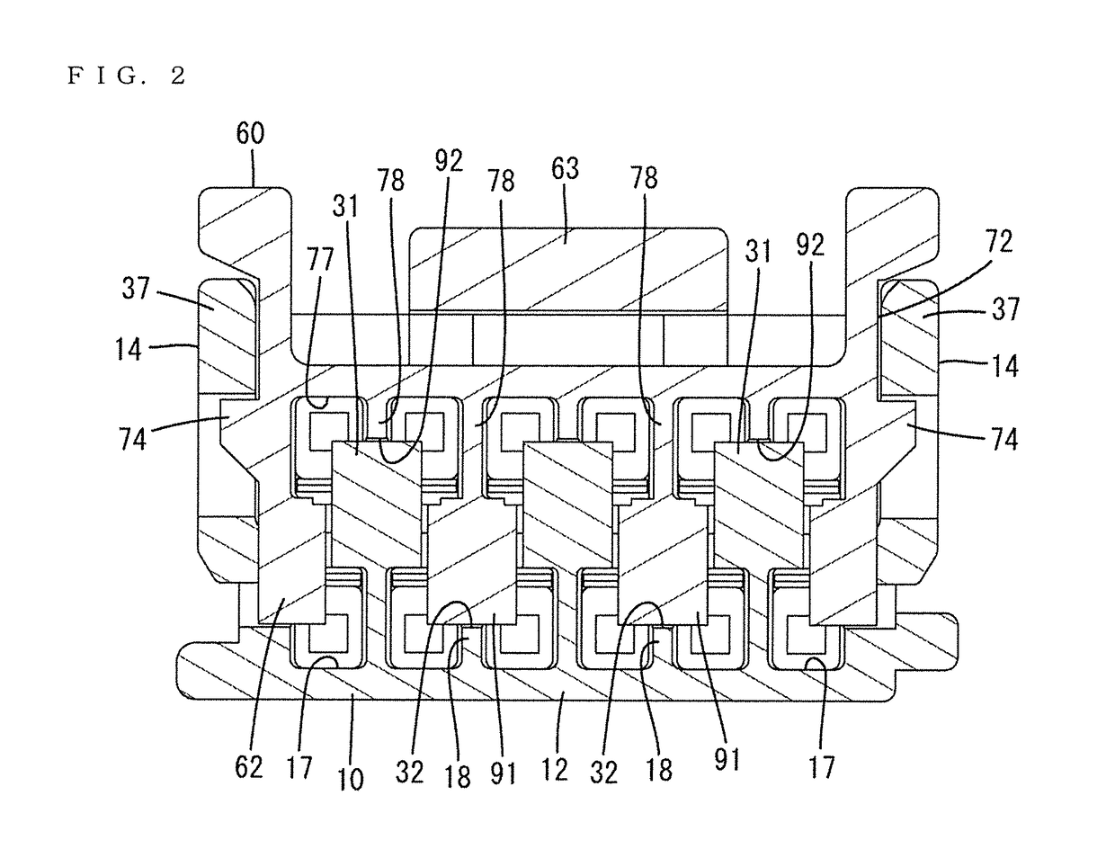 Connector with a deflectable locking lance exposed on an outer surface of a housing