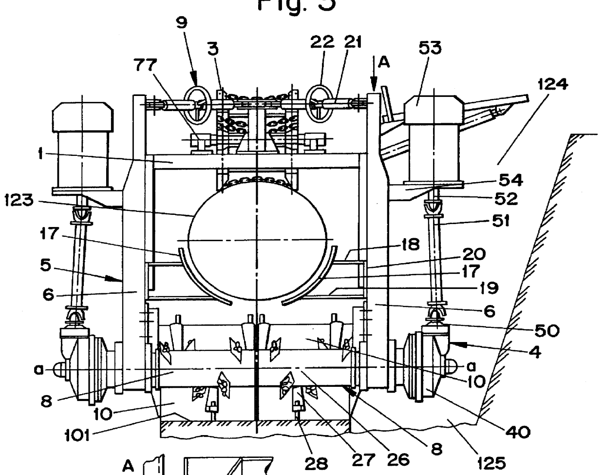 Machine for digging under pipes and caterpillar traction device