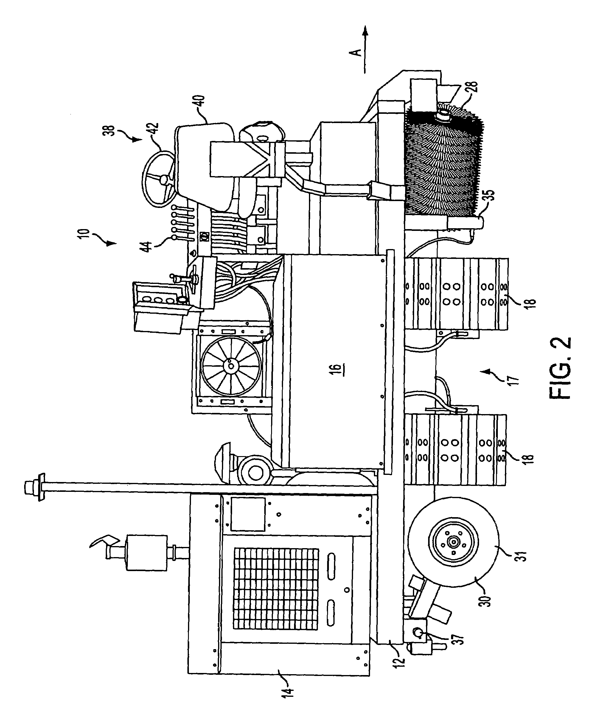 Apparatus for spreading aggregate material on a road berm