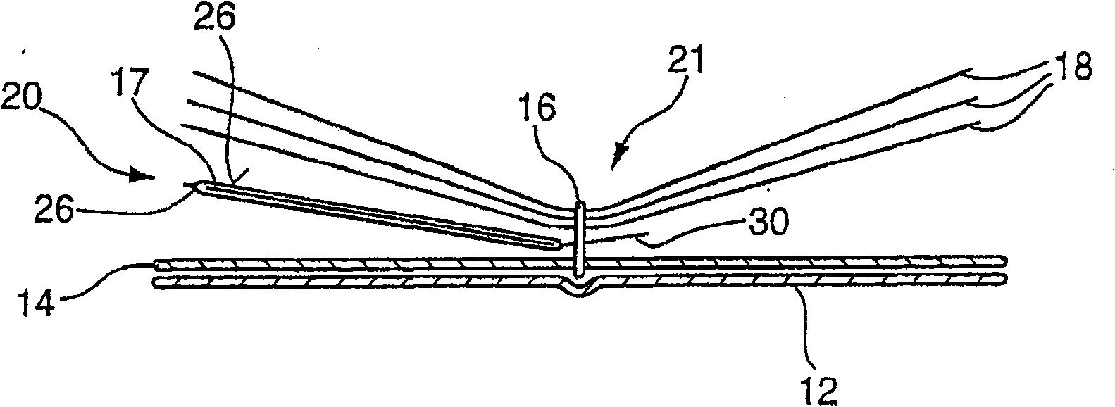 Method of producing a folded carrier arrangement, in particular for an identification document, and a carrier arrangement