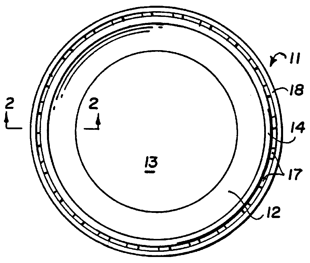 Container with curled tamper-evident band to retain closure