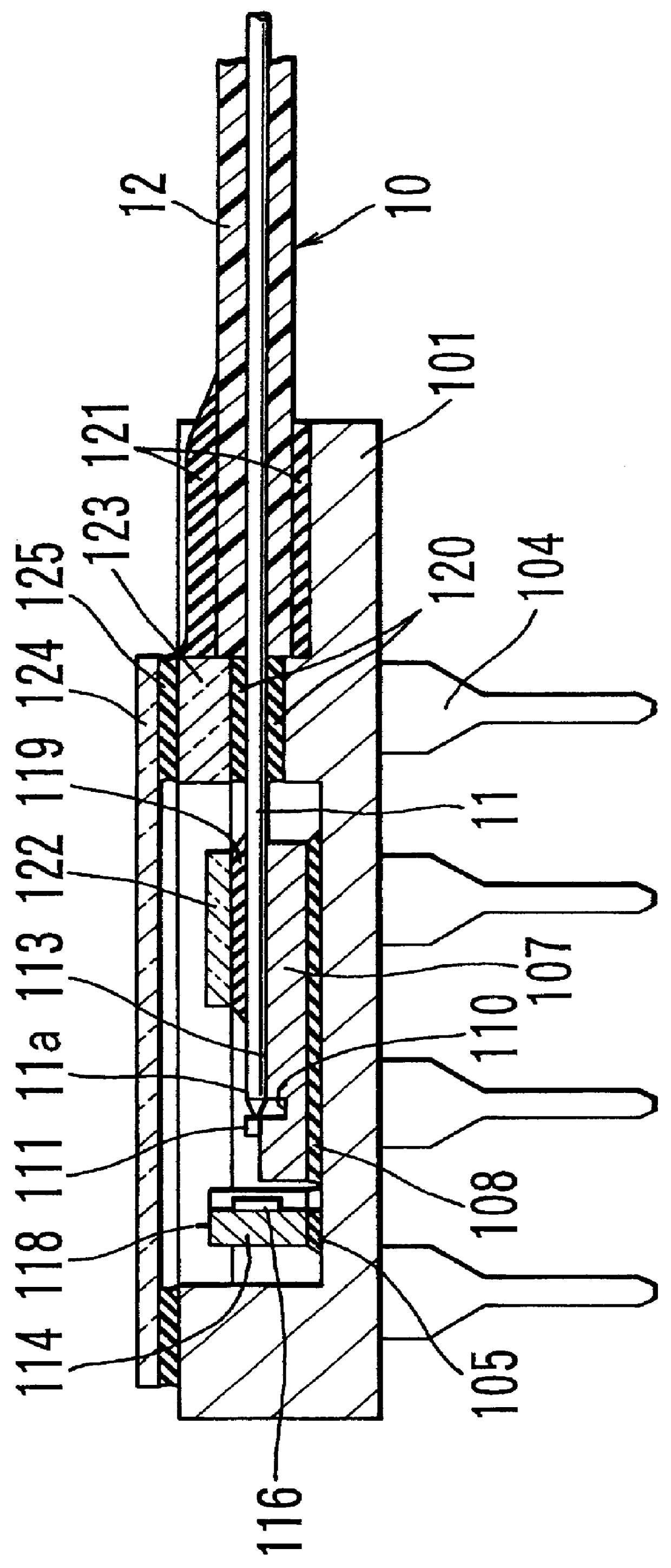 Optical fiber secured with a photosetting resin covered with a UV light-transmissive plate