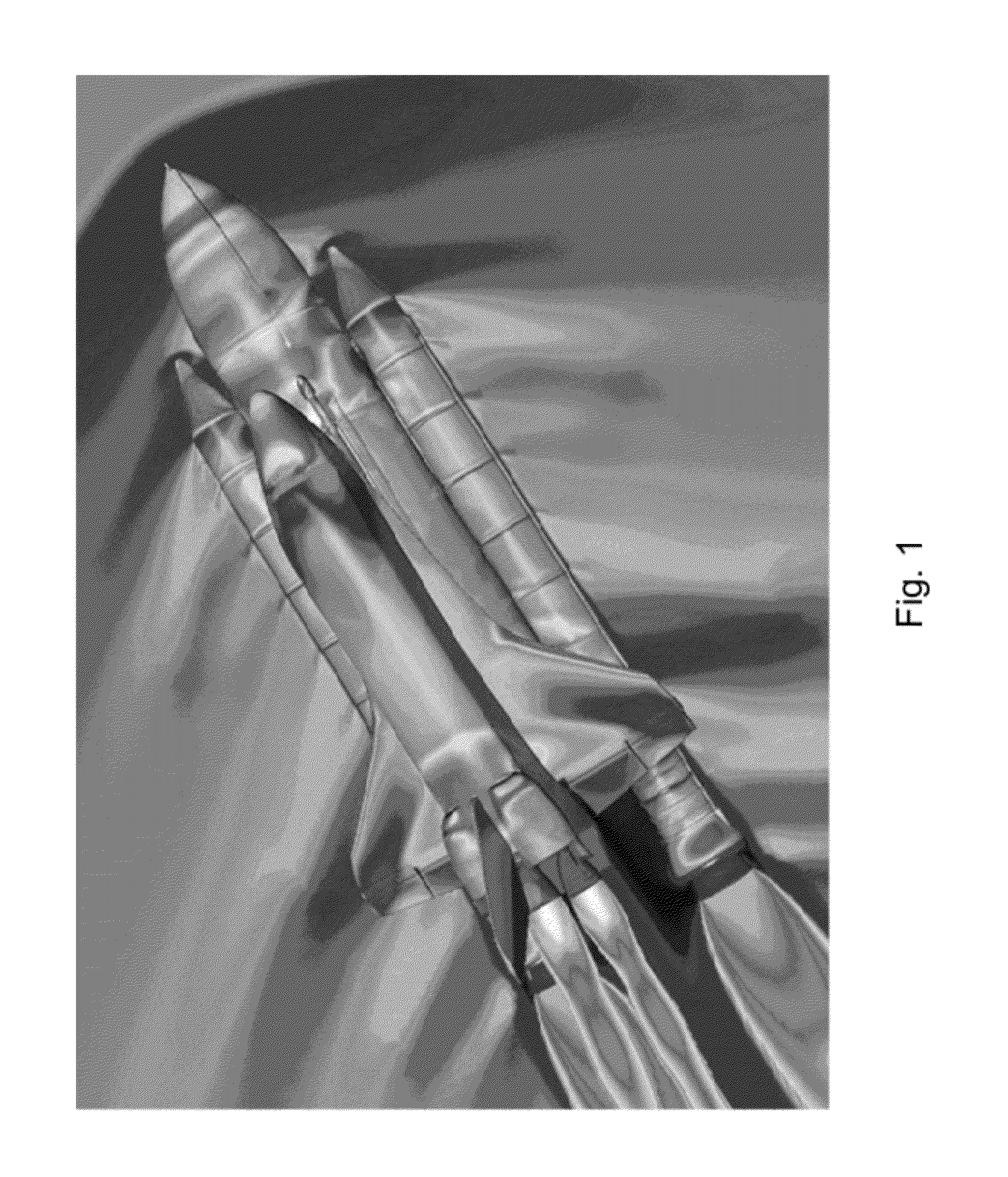 Generating inviscid and viscous fluid flow simulations over a surface using a quasi-simultaneous technique