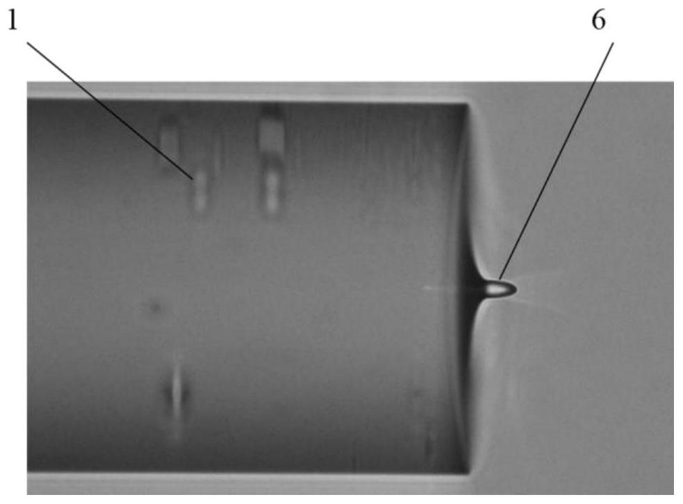 Method for generating Bessel-like beams by growing microcones on fiber end faces