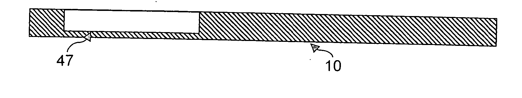 Microcircuit card attached to an adapter base, card base and manufacturing method