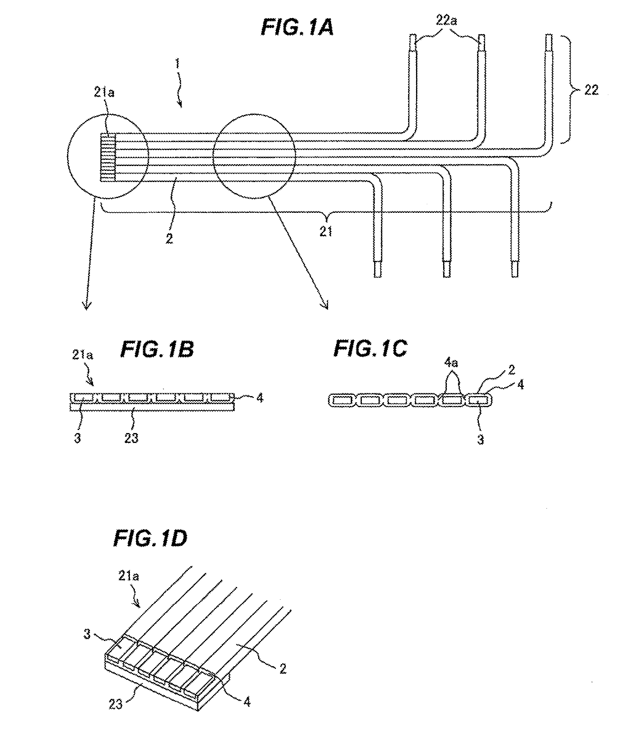 Flat wiring member and method of manufacturing the same