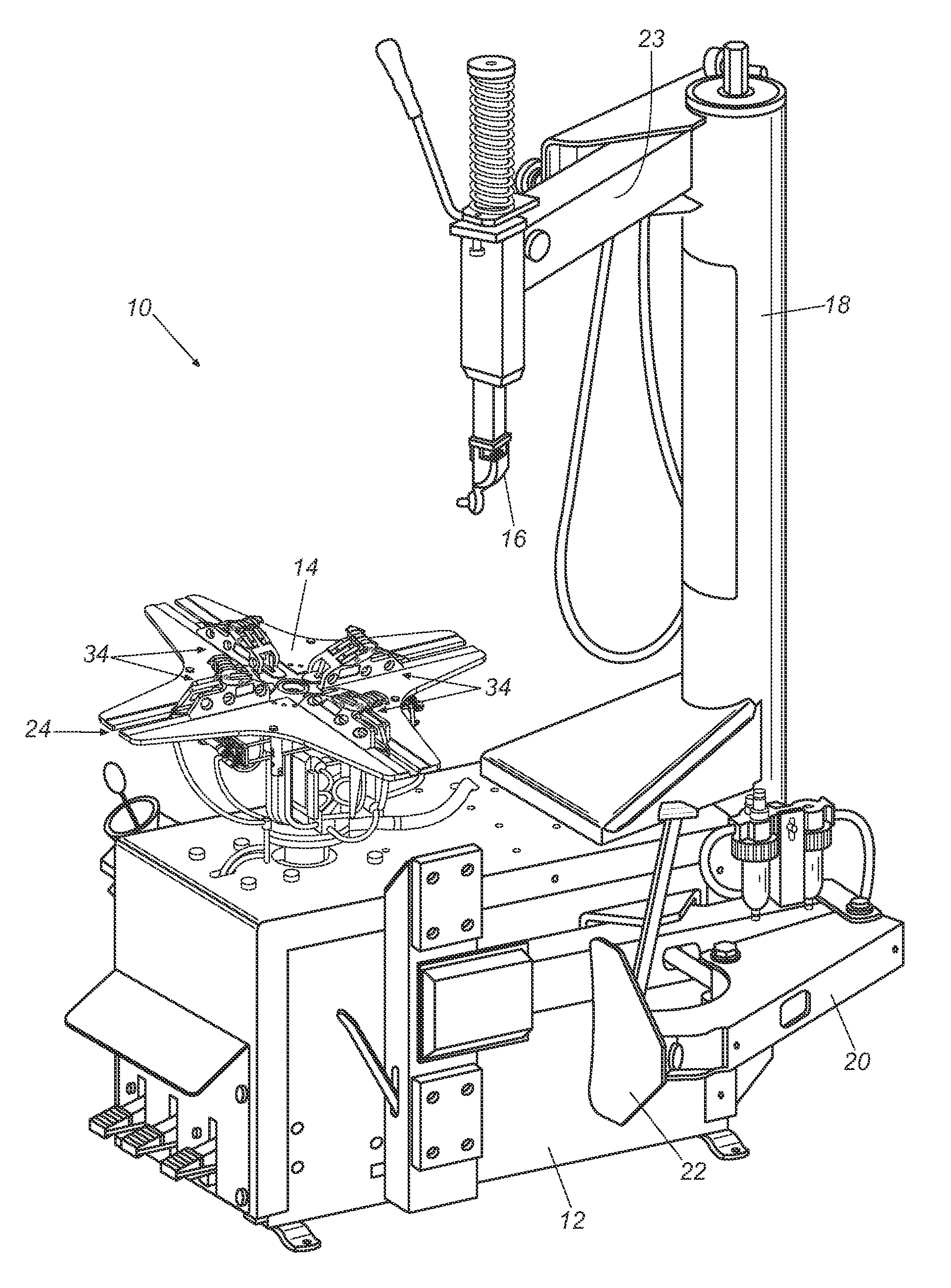 Lamintated clamp for a tire changer