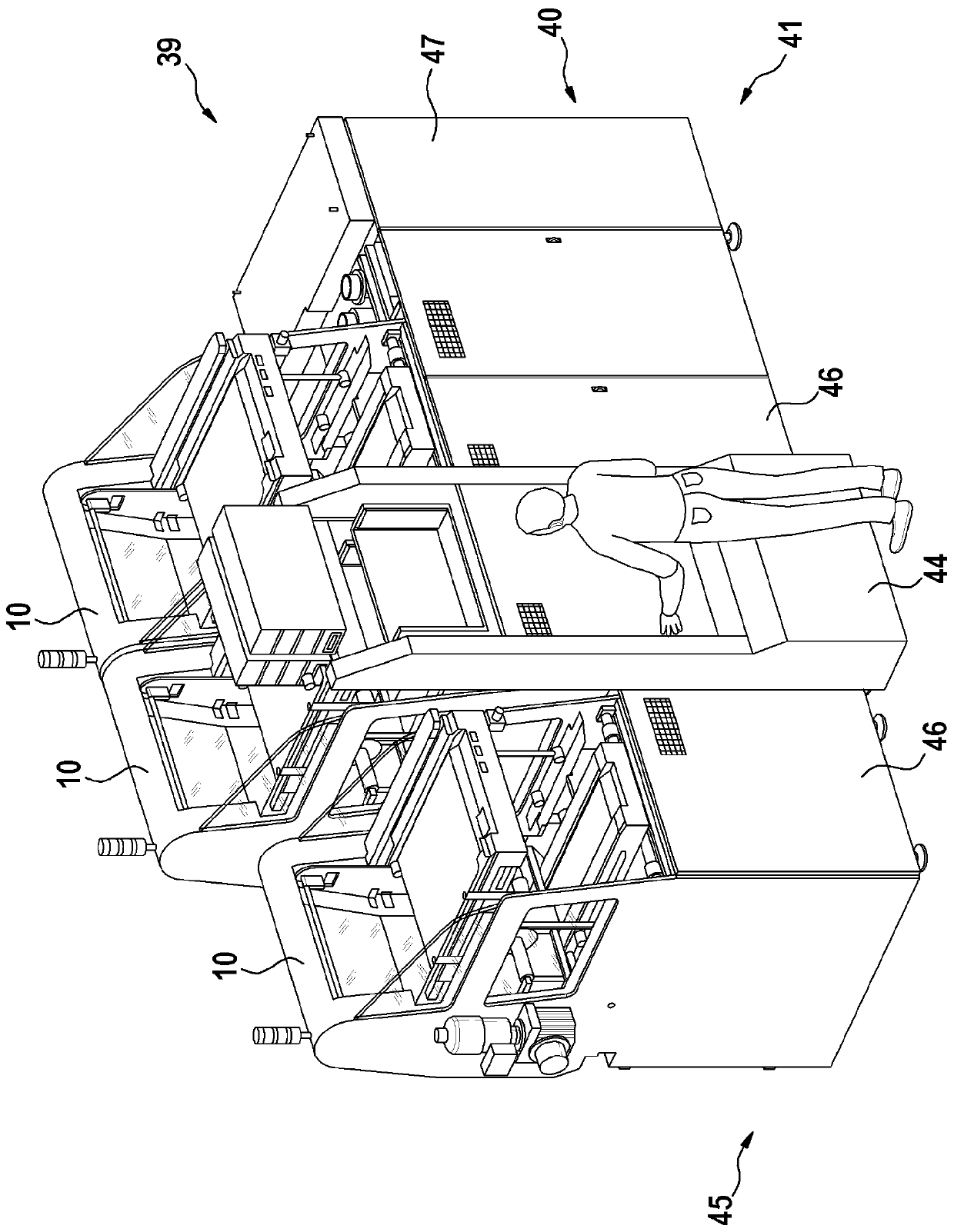 Tray emptying device and method for emptying a tray into a manufacturing machine and manufacturing system