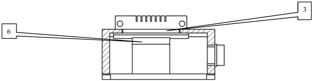 Miniature test clamp used for disk laser device for controlling shell temperature