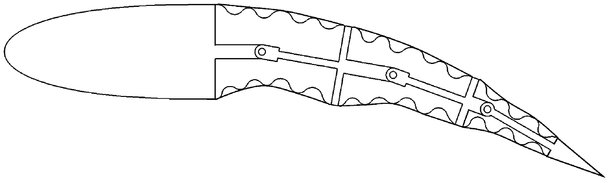 Variable camber wing based on composite corrugated plate flexible skins