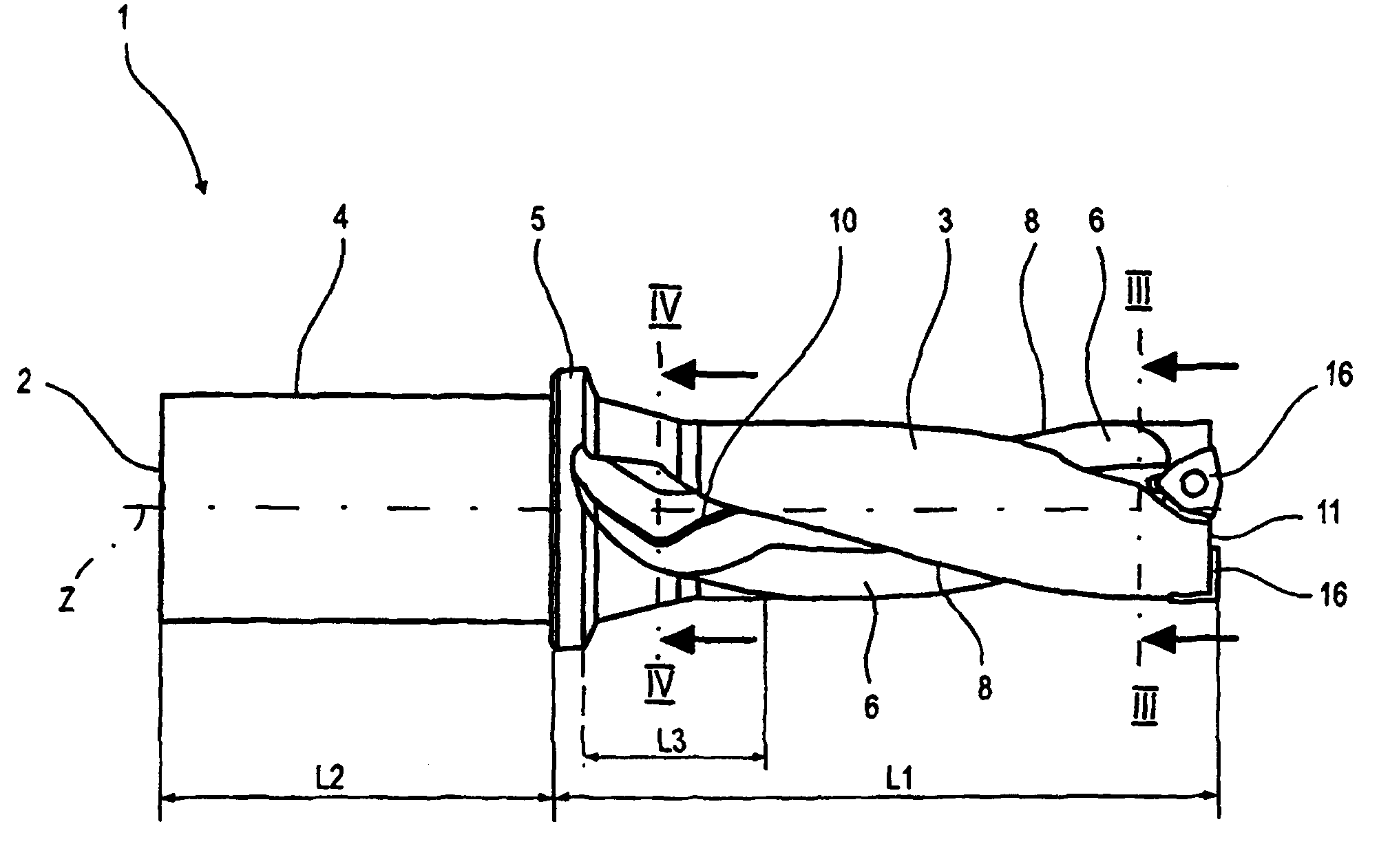 Twist drill having at least two cutting inserts at the tip each with its own J-shaped chip guiding flute and a method for the production thereof