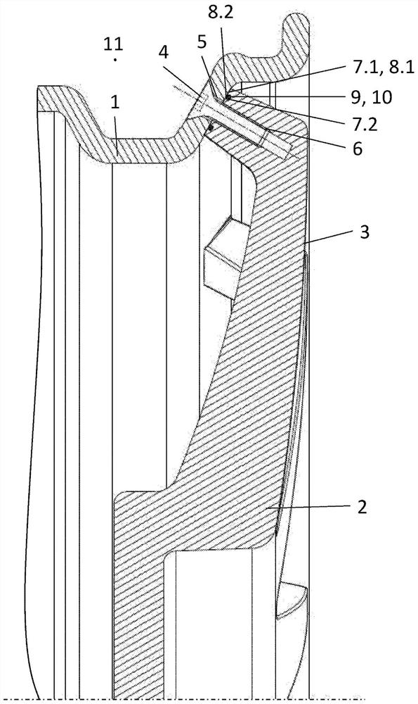 Multi-part vehicle wheel with a seal