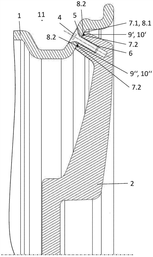 Multi-part vehicle wheel with a seal