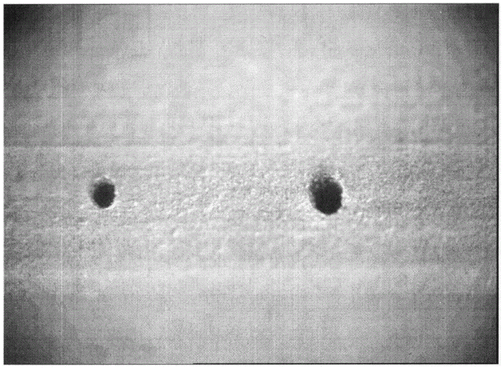 A non-contact method for measuring the diameter and coordinate position of tiny holes on spatial curved surfaces