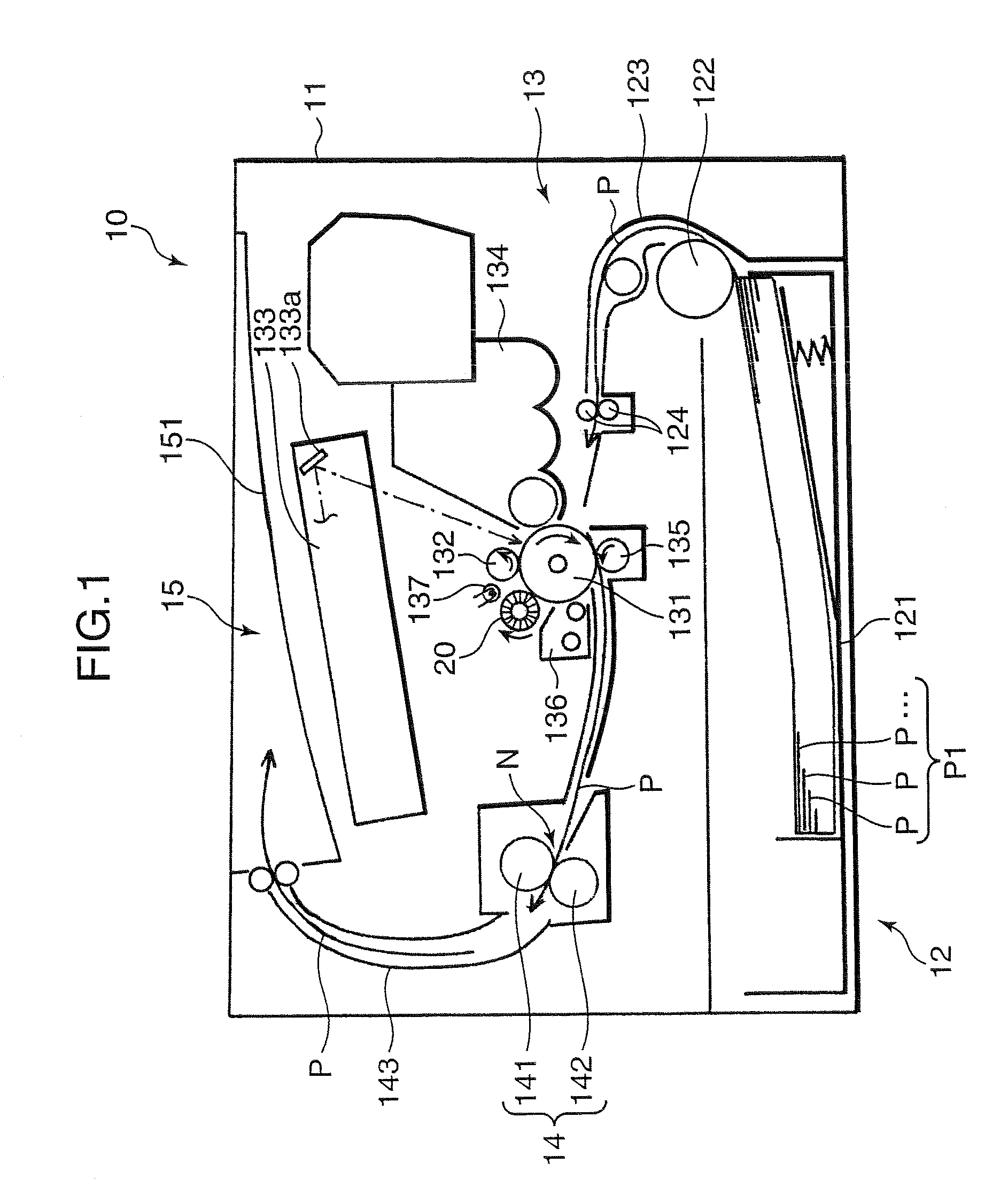 Image forming apparatus with cleaning device for removing remaining toner from outer surface of photosensitive member