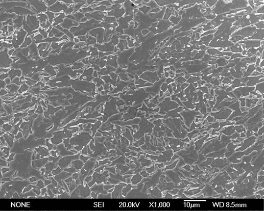 Low-Bauschinger-effect low-strain-aging-effect steel tube and manufacturing method thereof